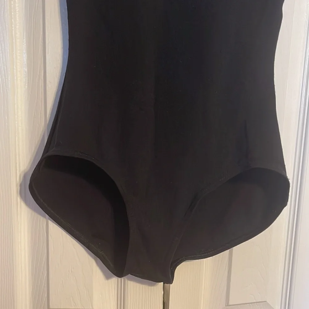 Capezio black sleeveless bodysuit in size small